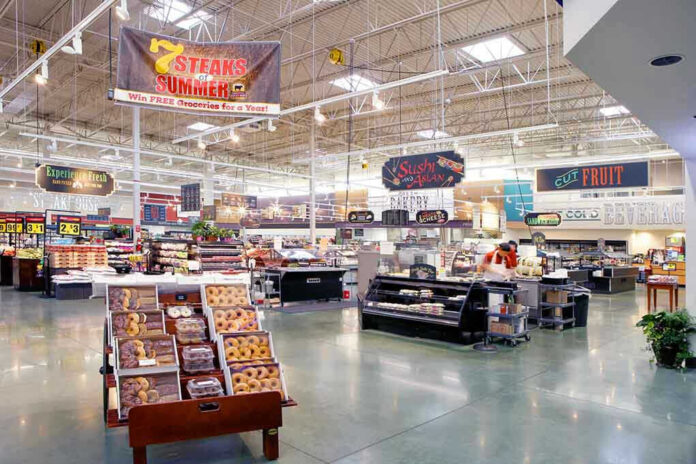 Supermarket interior with various food sections and displays