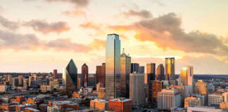 City skyline at sunset with modern skyscrapers