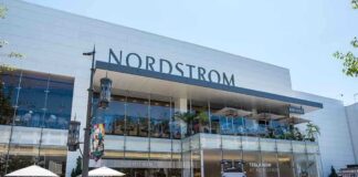 Exterior view of a Nordstrom store with outdoor dining area