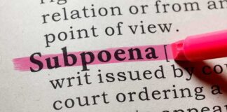 Highlighted definition of 'subpoena' in a dictionary