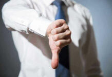 STUNNING Rejection Rocks State of the Union Person giving a thumbs down gesture.