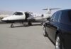 Bernie-Backed Mayor DOUBLES DOWN on Wealth Seizure A private jet parked at an airport with a luxury car in the foreground