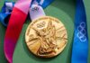 French Judge STEALS Gold From US Gold Olympic medal from the Tokyo 2020 Games with a colorful ribbon