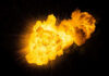 Bright, fiery explosion against a dark background.