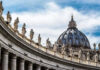 Pope Stuns Catholics With Death Penalty SHIFT St. Peters Basilica dome with statues and clouds.