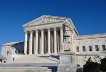 Mystery Surrounds: Truth Behind Viral Escape Rumor The Supreme Court building with large columns and a clear blue sky