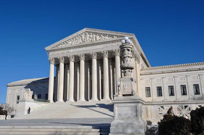 Supreme,Court,Building The Supreme Court building with large columns and a clear blue sky