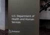 Sign for the U.S. Department of Health and Human Services with an entrance indication