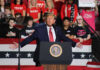 Primetime Bombshell: War Abroad, Elections at Home Politician speaking at rally with supporters behind him.