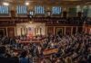 Competing Election Narratives Fuel Growing Public Distrust A crowded congressional chamber with members in discussion