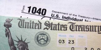 Close-up of a U.S. Treasury check and tax form 1040