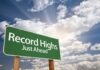Mega Heat Dome Parboils D.C. A green road sign indicating Record Highs Just Ahead against a cloudy sky