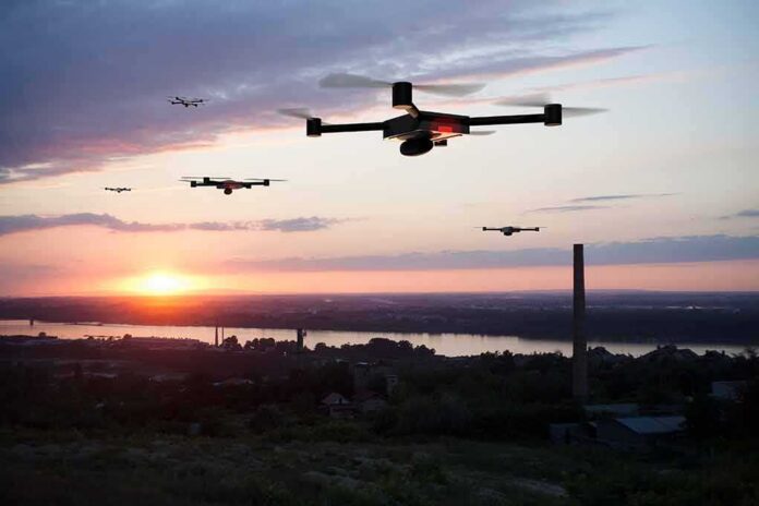 Drones flying over a river landscape at sunset