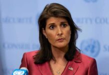 Nikki Haley speaks at a press conference podium