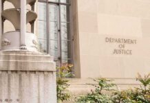 Prosecutor Exits Fail to Halt Federal Probe Department of Justice building facade with stone sign and window